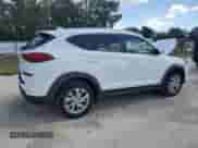 2021 Hyundai Tucson Value с VIN KM8J33A40MU311842, выставлен на аукционе Copart как лот 82171885 с пробегом 59 277 миль миль и Списание • Salvage title. История ставок и продаж доступна на DreamBid. Изображение 3.