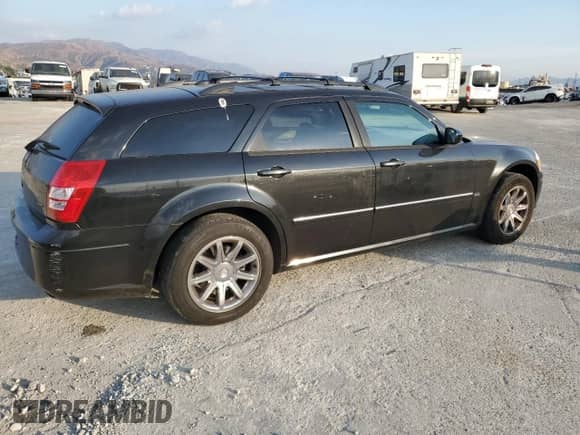 2005 Dodge Magnum SXT with VIN 2D8GZ48V95H648551, listed as a Copart auction lot 81199894 with 210,231 mi miles and Salvage title. Bid and sale history available at DreamBid. Image 3.