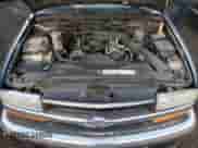 2001 Chevrolet Blazer LS z VIN 1GNCT18W91K121058, wystawiony jako Copart lot #42345925 z przebiegiem Nie podano mil oraz Szkoda całkowita • Salvage title. Historia ofert i sprzedaży dostępna na DreamBid. Obrazek 12.