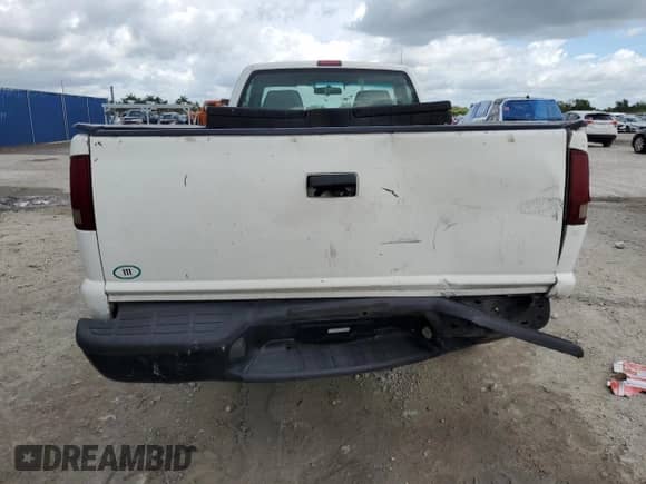 2000 Chevrolet S-10 с VIN 1GCCS1450YK211492, выставлен на аукционе Copart как лот 62325515 с пробегом 218 074 миль миль и Списание • Salvage title. История ставок и продаж доступна на DreamBid. Изображение 10.