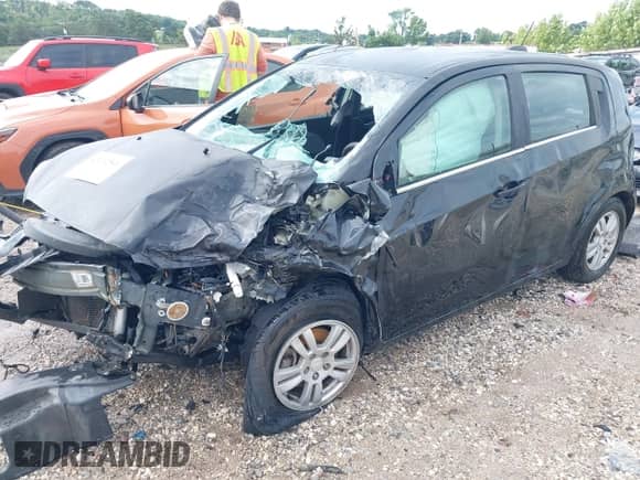 2015 Chevrolet Sonic LT with VIN 1G1JC6SH3F4103618, listed as a IAAI auction lot 43102541 with Not provided miles and . Bid and sale history available at DreamBid. Image 2.
