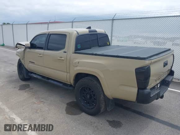 2017 Toyota Tacoma SR5 with VIN 3TMAZ5CN6HM039733, listed as a IAAI auction lot 42332541 with 148,010 mi miles and . Bid and sale history available at DreamBid. Image 3.