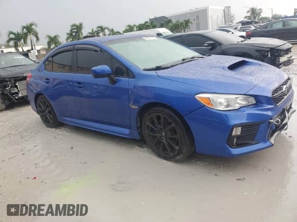 2020 Subaru WRX Premium with VIN JF1VA1C63L9803335, listed as a Copart auction lot 80551315 with 56,987 mi miles and Salvage title. Bid and sale history available at DreamBid. Image 4.