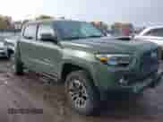 2021 Toyota Tacoma SR z VIN 3TMCZ5AN0MM378204, wystawiony jako IAAI lot #43469855 z przebiegiem 48 476 mil mil oraz . Historia ofert i sprzedaży dostępna na DreamBid. Obrazek 1.