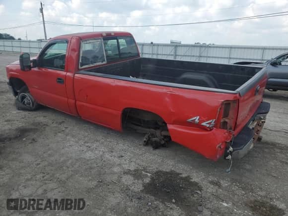 2000 Chevrolet Silverado 1500 with VIN 1GCEK14W2YE218542, listed as a Copart auction lot 64623235 with 242,232 mi miles and Salvage title. Bid and sale history available at DreamBid. Image 2.