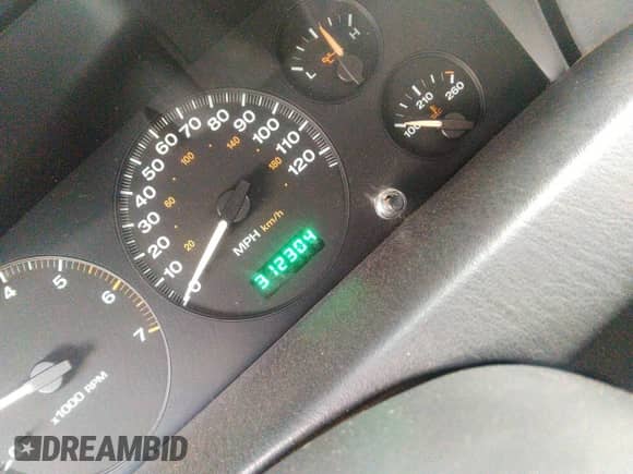 2003 Jeep Grand Cherokee Laredo z VIN 1J4GX48S53C543557, wystawiony jako IAAI lot #43123734 z przebiegiem 312 304 mil mil oraz . Historia ofert i sprzedaży dostępna na DreamBid. Obrazek 7.