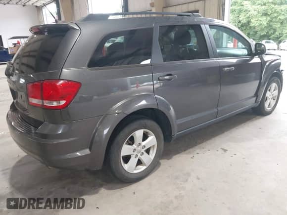 2015 Dodge Journey American Value with VIN 3C4PDCAB1FT744948, listed as a IAAI auction lot 42976982 with 77,765 mi miles and . Bid and sale history available at DreamBid. Image 4.