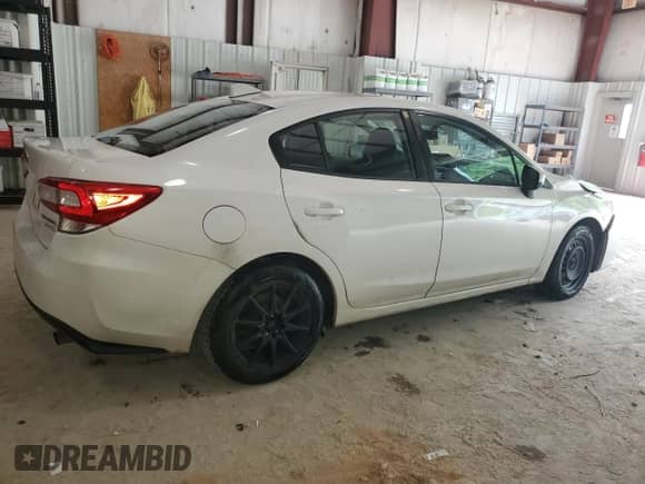 2017 Subaru Impreza Premium with VIN 4S3GKAD65H3606790, listed as a Copart auction lot 63044455 with 166,340 mi miles and Salvage title. Bid and sale history available at DreamBid. Image 3.