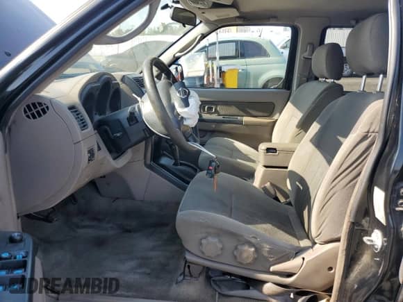 2004 Nissan Frontier XE with VIN 1N6ED27T64C477426, listed as a Copart auction lot 68329535 with 132,259 mi miles and Salvage title. Bid and sale history available at DreamBid. Image 7.