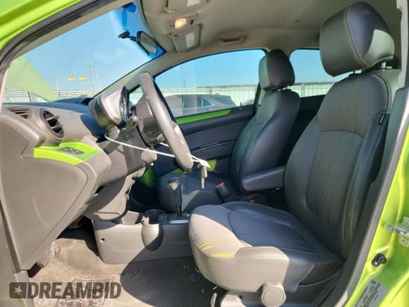 2014 Chevrolet Spark LS with VIN KL8CB6S94EC565436, listed as a Copart auction lot 86057295 with 106,927 mi miles and Salvage title. Bid and sale history available at DreamBid. Image 7.