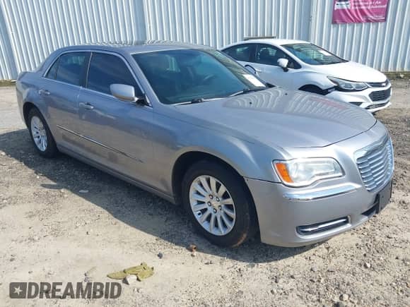 2014 Chrysler 300 with VIN 2C3CCAAG1EH375943, listed as a IAAI auction lot 43178893 with 209,099 mi miles and . Bid and sale history available at DreamBid. Image 1.