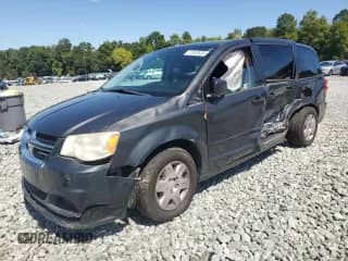 2011 Dodge Grand Caravan Express with VIN 2D4RN4DG2BR767786, listed as a Copart auction lot 72032635 with 105,012 mi miles and Salvage title. Bid and sale history available at DreamBid. Image 1.