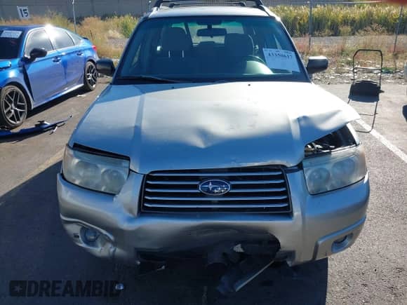2006 Subaru Forester X with VIN JF1SG63616H735660, listed as a IAAI auction lot 43350617 with 165,881 mi miles and . Bid and sale history available at DreamBid. Image 12.