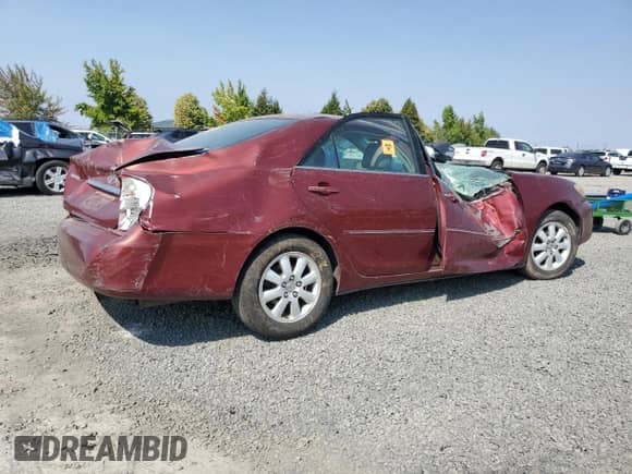 2003 Toyota Camry LE with VIN 4T1BE30K53U220952, listed as a Copart auction lot 70885845 with Not provided miles and Salvage title. Bid and sale history available at DreamBid. Image 3.
