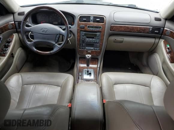 2003 Hyundai XG с VIN KMHFU45E03A262296, выставлен на аукционе Copart как лот 67608394 с пробегом 116 296 миль миль и Списание • Salvage title. История ставок и продаж доступна на DreamBid. Изображение 8.