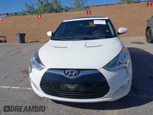 2013 Hyundai Veloster w/Black Int z VIN KMHTC6AD2DU108431, wystawiony jako IAAI lot #43187374 z przebiegiem 135 808 mil mil oraz . Historia ofert i sprzedaży dostępna na DreamBid. Obrazek 6.