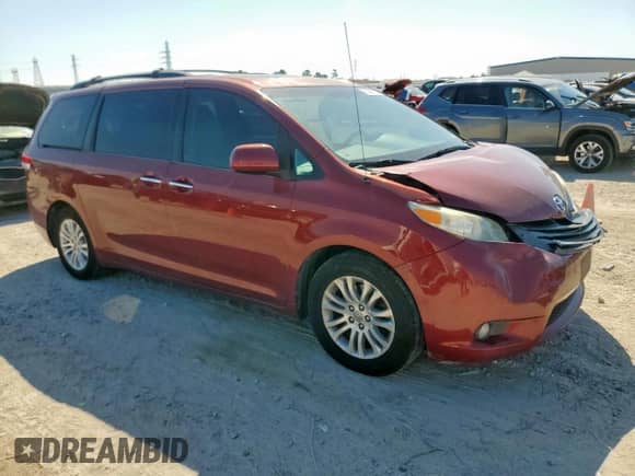2014 Toyota Sienna XLE with VIN 5TDYK3DC1ES468830, listed as a Copart auction lot 85565925 with 190,880 mi miles and Salvage title. Bid and sale history available at DreamBid. Image 4.