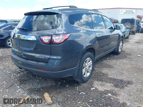 2013 Chevrolet Traverse LT with VIN 1GNKVJKD7DJ209355, listed as a IAAI auction lot 42842885 with 178,604 mi miles and . Bid and sale history available at DreamBid. Image 4.