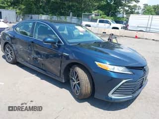 2021 Toyota Camry Hybrid XLE with VIN 4T1F31AK3MU554067, listed as a IAAI auction lot 42681018 with 53,630 mi miles and . Bid and sale history available at DreamBid. Image 1.