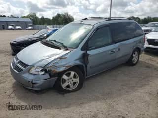 2006 Dodge Caravan SXT with VIN 1D4GP45RX6B738669, listed as a Copart auction lot 60541445 with 235,170 mi miles and Salvage title. Bid and sale history available at DreamBid. Image 1.