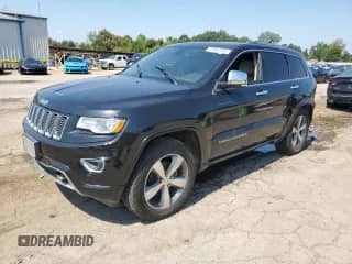 2015 Jeep Grand Cherokee Overland with VIN 1C4RJFCG9FC165794, listed as a Copart auction lot 72057355 with 191,194 mi miles and Salvage title. Bid and sale history available at DreamBid. Image 1.