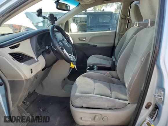 2015 Toyota Sienna LE AAS with VIN 5TDKK3DC7FS591099, listed as a Copart auction lot 65522525 with 174,792 mi miles and Salvage title. Bid and sale history available at DreamBid. Image 7.