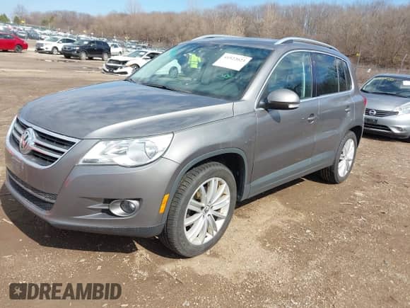2011 Volkswagen Tiguan S with VIN WVGBV7AX2BW533378, listed as a IAAI auction lot 41922023 with 110,452 mi miles and . Bid and sale history available at DreamBid. Image 2.