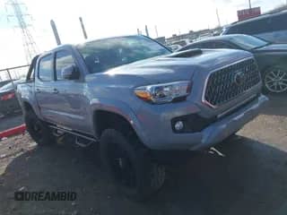 2019 Toyota Tacoma SR z VIN 3TMCZ5AN2KM206172, wystawiony jako IAAI lot #41211900 z przebiegiem 79 411 mil mil oraz . Historia ofert i sprzedaży dostępna na DreamBid. Obrazek 1.