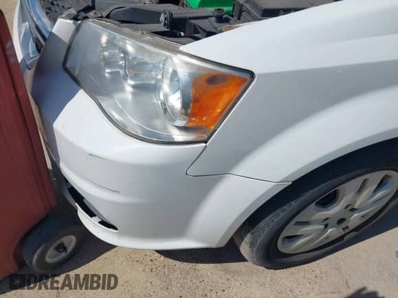 2015 Dodge Grand Caravan SE with VIN 2C4RDGBG8FR636193, listed as a IAAI auction lot 43284825 with 125,185 mi miles and . Bid and sale history available at DreamBid. Image 6.