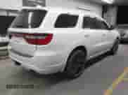 2015 Dodge Durango SXT with VIN 1C4RDJAG4FC202716, listed as a IAAI auction lot 43142717 with 169,362 mi miles and . Bid and sale history available at DreamBid. Image 4.