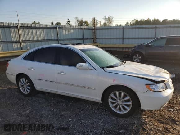 2007 Hyundai Azera SE с VIN KMHFC46F27A140975, выставлен на аукционе Copart как лот 74530674 с пробегом 73 188 миль миль и Списание • Salvage title. История ставок и продаж доступна на DreamBid. Изображение 4.