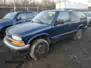 2001 Chevrolet Blazer LS z VIN 1GNCT18W91K121058, wystawiony jako Copart lot #42345925 z przebiegiem Nie podano mil oraz Szkoda całkowita • Salvage title. Historia ofert i sprzedaży dostępna na DreamBid. Obrazek 1.