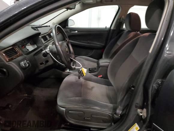 2013 Chevrolet Impala LS with VIN 2G1WA5E34D1198432, listed as a Copart auction lot 82495865 with 145,491 mi miles and Salvage title. Bid and sale history available at DreamBid. Image 7.