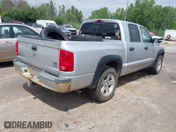 2007 Dodge Dakota Laramie with VIN 1D7HW58P77S270928, listed as a IAAI auction lot 42668463 with 162,468 mi miles and . Bid and sale history available at DreamBid. Image 4.