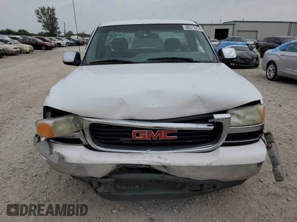 1999 GMC Sierra 1500 SL z VIN 1GTEC14V3XE544949, wystawiony jako Copart lot #68512264 z przebiegiem Nie podano mil oraz Szkoda całkowita • Salvage title. Historia ofert i sprzedaży dostępna na DreamBid. Obrazek 5.