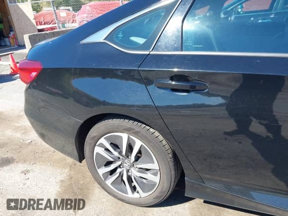 2018 Honda Accord with VIN 1HGCV3F10JA010119, listed as a IAAI auction lot 43362793 with 206,392 mi miles and . Bid and sale history available at DreamBid. Image 6.