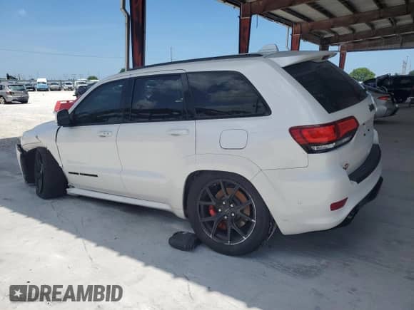 2018 Jeep Grand Cherokee SRT с VIN 1C4RJFDJ5JC397246, выставлен на аукционе Copart как лот 57310555 с пробегом 79 552 миль миль и Списание • Salvage title. История ставок и продаж доступна на DreamBid. Изображение 2.