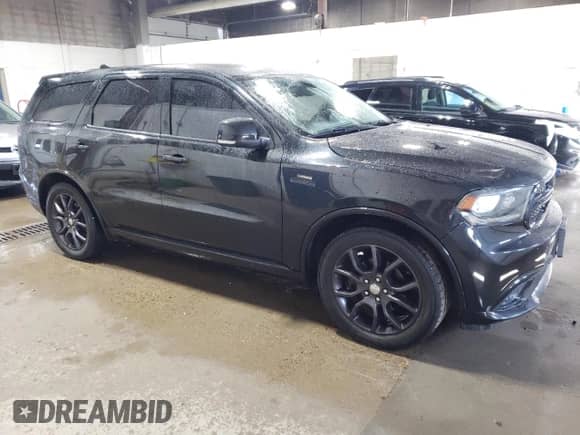 2015 Dodge Durango с VIN DPSMN181607, выставлен на аукционе Copart как лот 52896105 с пробегом 113 066 миль миль и Списание • Salvage title. История ставок и продаж доступна на DreamBid. Изображение 4.