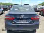 2021 Toyota Camry LE z VIN 4T1C11AK7MU516429, wystawiony jako IAAI lot #42794424 z przebiegiem 52 924 mil mil oraz . Historia ofert i sprzedaży dostępna na DreamBid. Obrazek 16.