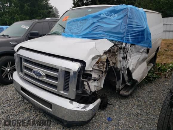 2013 Ford Econoline Cargo Commercial с VIN 1FTNE2EWXDDA96461, выставлен на аукционе Copart как лот 71060615 с пробегом Не указан миль и Списание • Salvage title. История ставок и продаж доступна на DreamBid. Изображение 1.