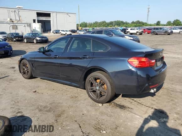 2015 BMW 4 Series 428i xDrive z VIN WBA4C9C59FD330304, wystawiony jako Copart lot #64786165 z przebiegiem 156 889 mil mil oraz Szkoda całkowita • Salvage title. Historia ofert i sprzedaży dostępna na DreamBid. Obrazek 2.