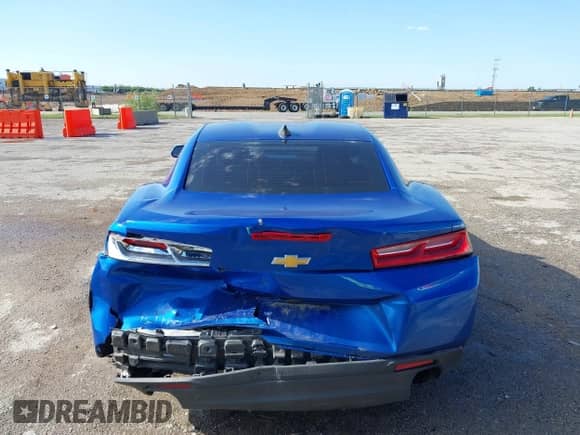 2018 Chevrolet Camaro 1LS z VIN 1G1FA1RX6J0169186, wystawiony jako IAAI lot #42102784 z przebiegiem 51 463 mil mil oraz . Historia ofert i sprzedaży dostępna na DreamBid. Obrazek 16.