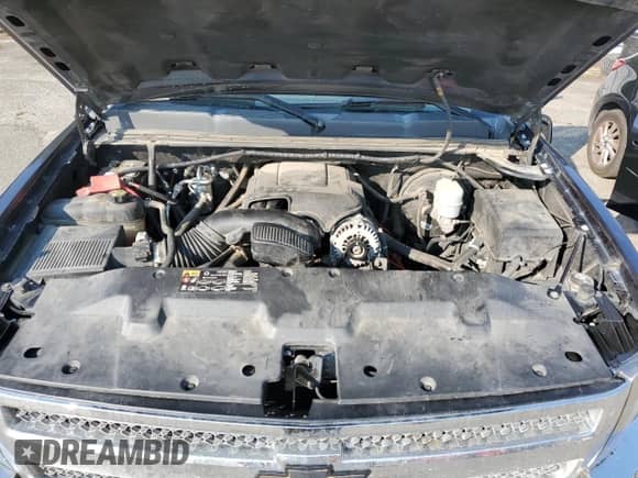 2013 Chevrolet Silverado 1500 LT z VIN 1GCRKSE79DZ215929, wystawiony jako Copart lot #83750135 z przebiegiem 163 596 mil mil oraz Szkoda całkowita • Salvage title. Historia ofert i sprzedaży dostępna na DreamBid. Obrazek 11.