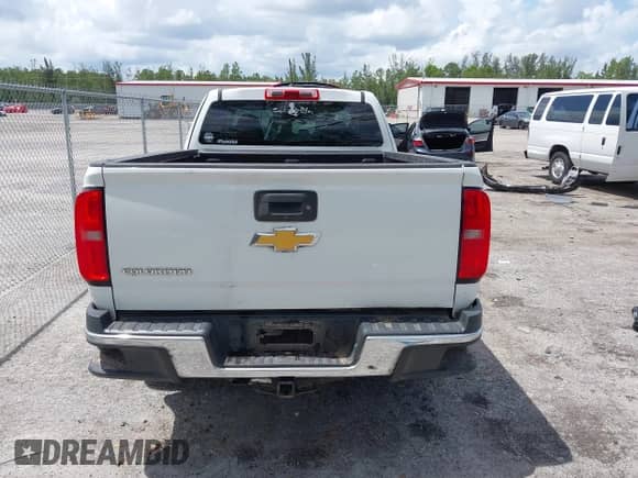 2018 Chevrolet Colorado 2WD Work Truck с VIN 1GCHSBEA7J1241771, выставлен на аукционе IAAI как лот 42460601 с пробегом 82 879 миль миль и . История ставок и продаж доступна на DreamBid. Изображение 16.