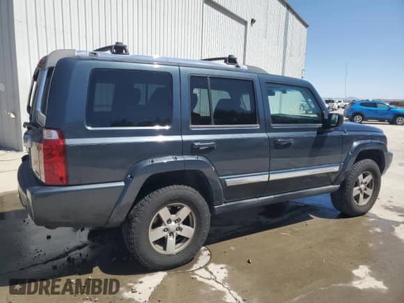 2007 Jeep Commander Limited z VIN 1J8HG58287C608187, wystawiony jako Copart lot #52937855 z przebiegiem 163 456 mil mil oraz Szkoda całkowita • Salvage title. Historia ofert i sprzedaży dostępna na DreamBid. Obrazek 3.