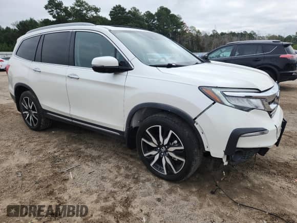 2019 Honda Pilot Touring 8-Passenger z VIN 5FNYF5H91KB018111, wystawiony jako Copart lot #71864465 z przebiegiem 96 937 mil mil oraz Szkoda całkowita • Salvage title. Historia ofert i sprzedaży dostępna na DreamBid. Obrazek 4.