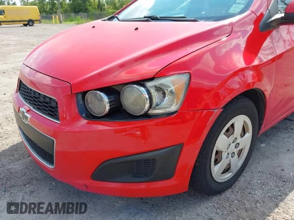 2016 Chevrolet Sonic LS with VIN 1G1JA5SHXG4163963, listed as a IAAI auction lot 43089828 with 169,519 mi miles and . Bid and sale history available at DreamBid. Image 6.