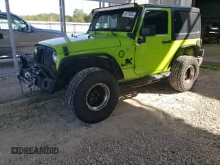 2013 Jeep Wrangler Sport z VIN 1C4AJWAG9DL504731, wystawiony jako Copart lot #83779935 z przebiegiem 82 047 mil mil oraz Szkoda całkowita • Salvage title. Historia ofert i sprzedaży dostępna na DreamBid. Obrazek 1.