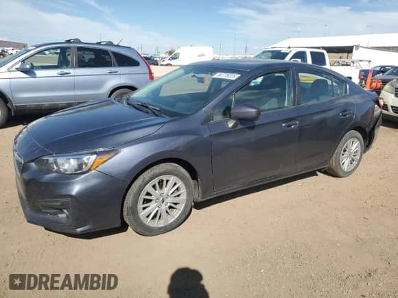 2017 Subaru Impreza Premium with VIN 4S3GKAD64H3628635, listed as a Copart auction lot 84778225 with 81,735 mi miles and Salvage title. Bid and sale history available at DreamBid. Image 1.