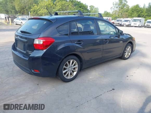 2012 Subaru Impreza Premium with VIN JF1GPAC63CG239740, listed as a IAAI auction lot 42838296 with 113,898 mi miles and . Bid and sale history available at DreamBid. Image 4.